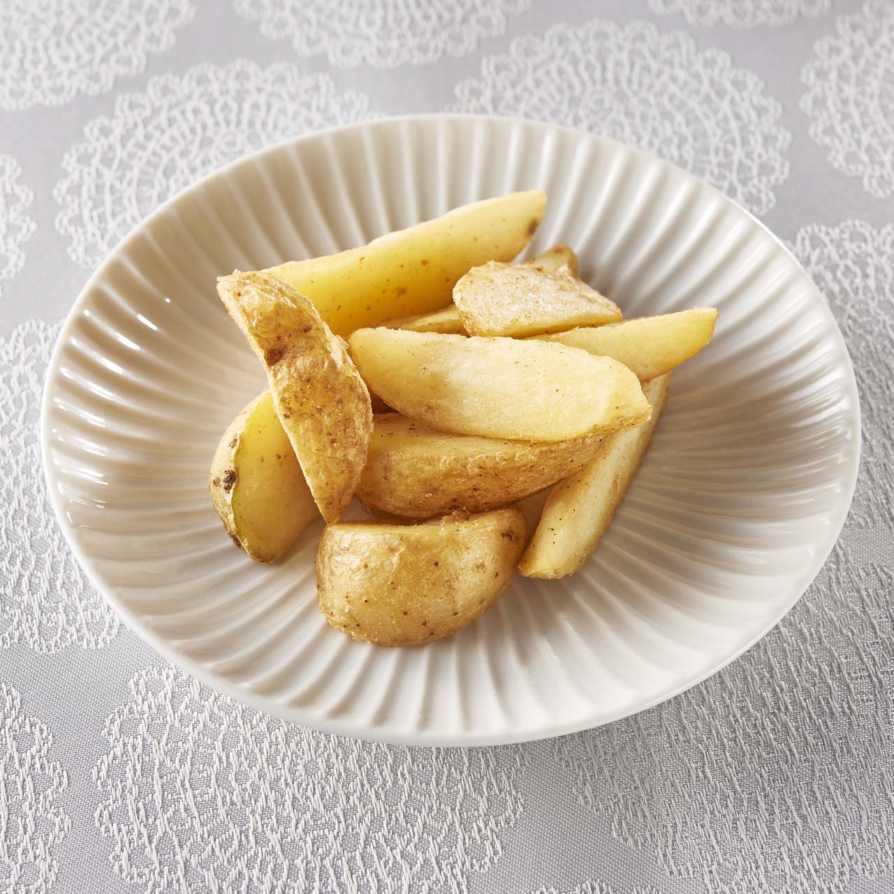 小僧寿し スパイスをかけたカリッとフライドポテト(100g)