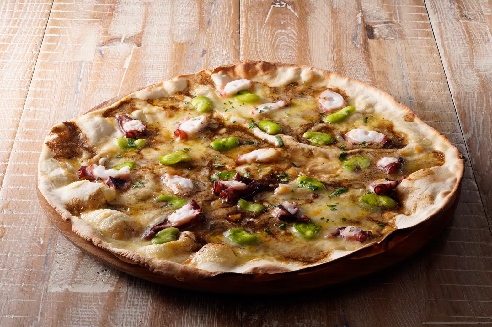 タコと空豆の焦がしガーリックバター醤油