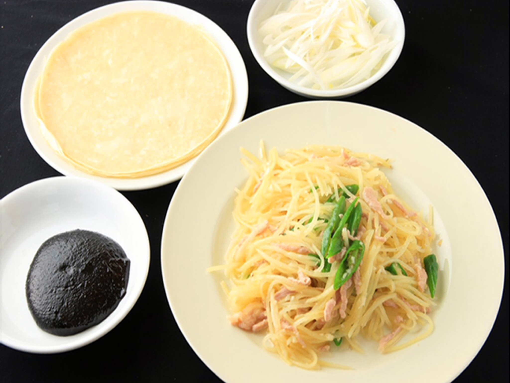 永利 じゃが芋千切りとピーマン炒めクレープ包み